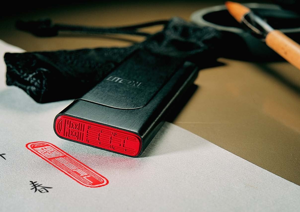 Seal TV dongle — with red Chinese seal detail